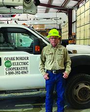 Steve Hager standing by OBEC truck